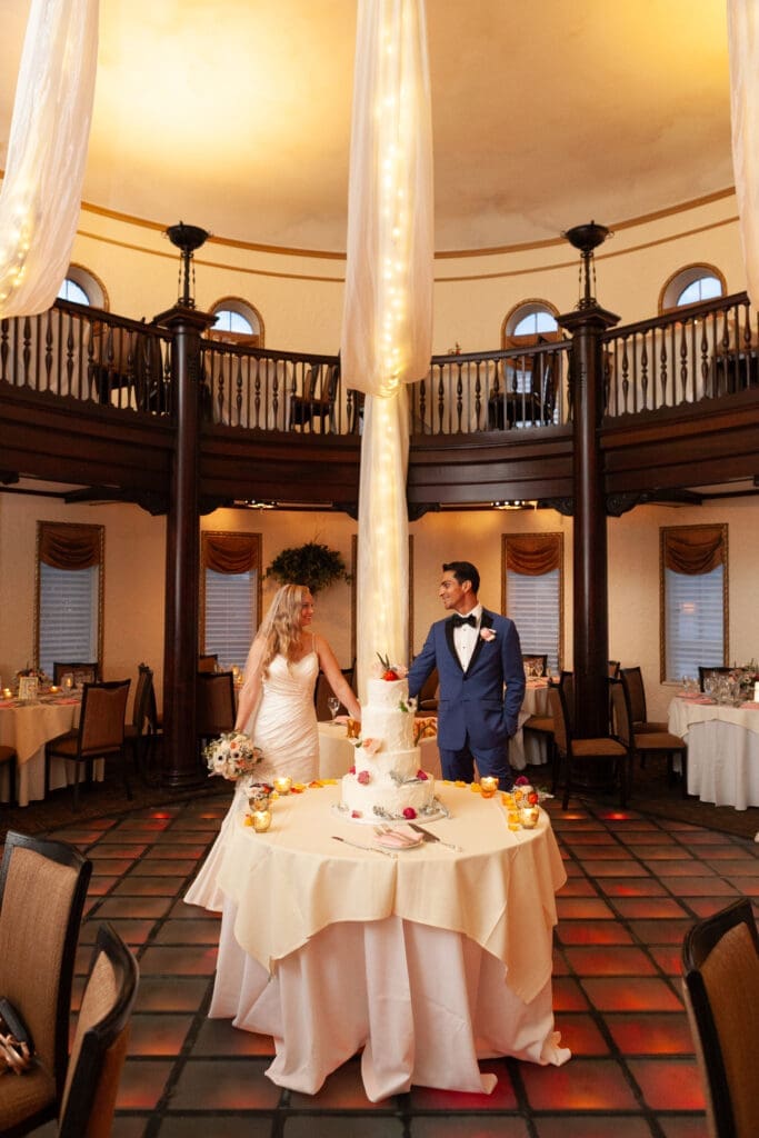 Bride and groom in the Rainbow Room at Hotel Baker St. Charles IL.