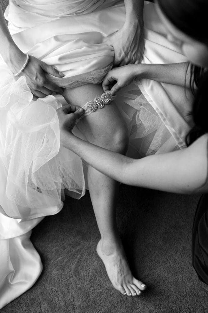 Bride pudding on her Garter at Hotel Baker St Charles.