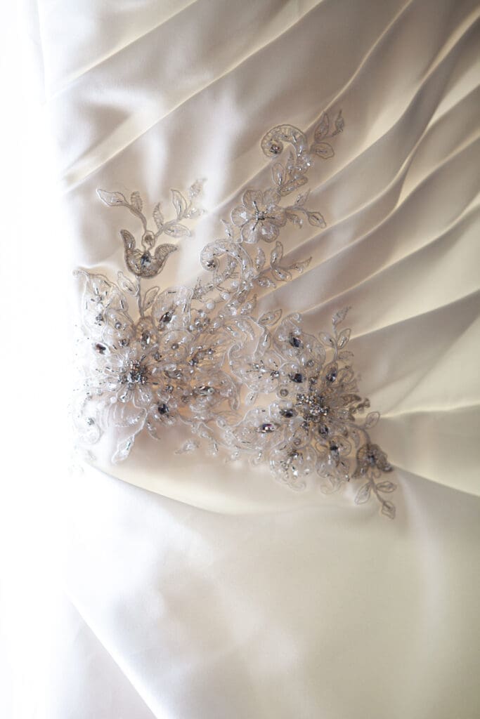 Details and beating of the intricate wedding luxury vintage dress St Charles IL Hotel Baker.