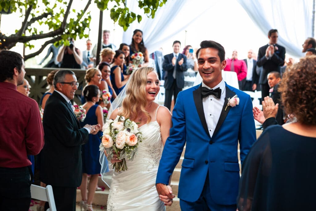 Bride and groom portrait along the Fox River outside Hotel Baker in St Charles Illinois