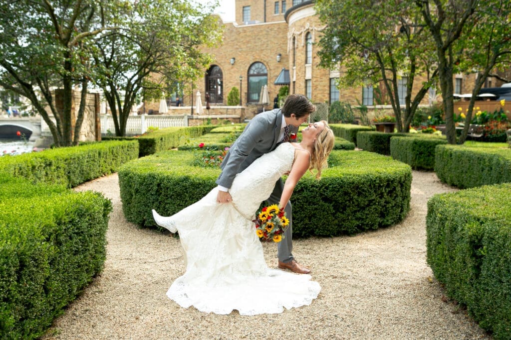 Groom dipping bride at Hotel Baker St. Charles.
