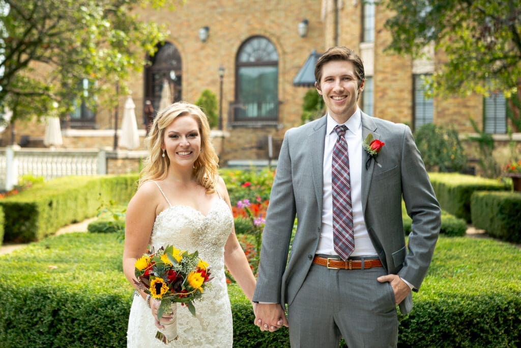 Bride and groom portrait in the garden at Hotel Baker.