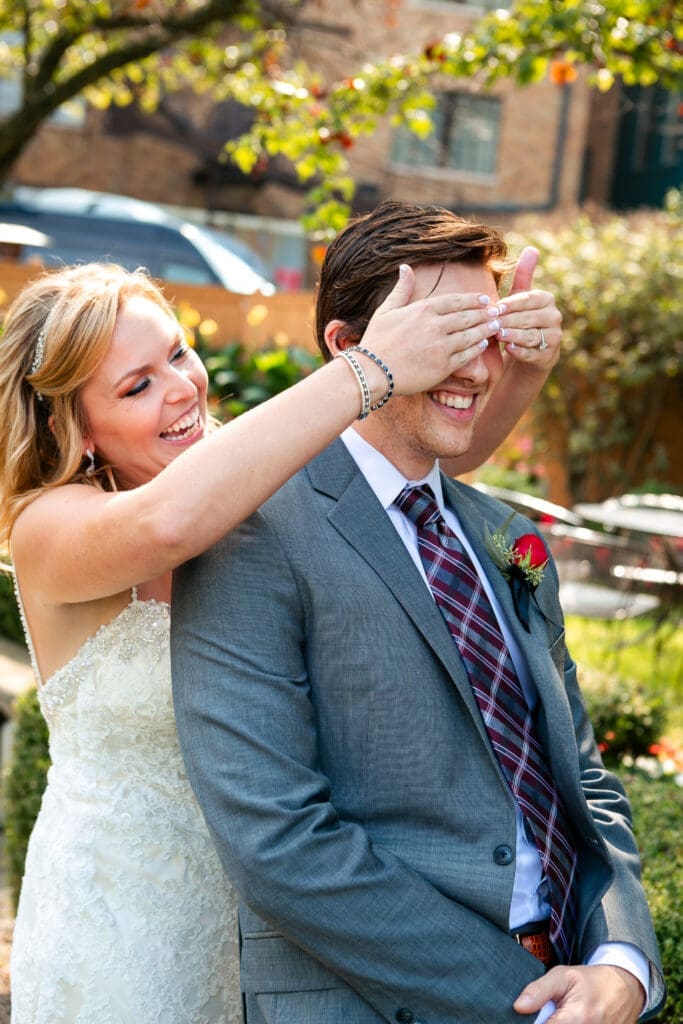 Bride smiling just before her first look with her groom.