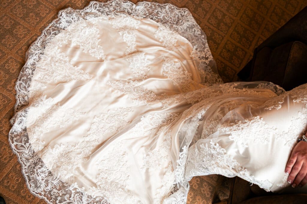Elegant wedding dress details and lace at Hotel Baker.