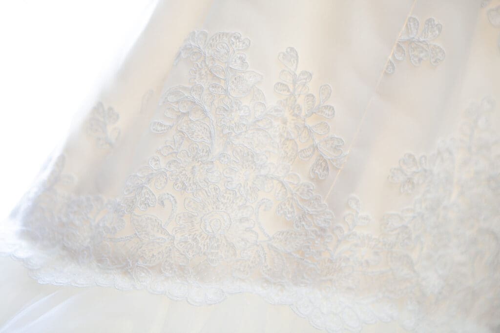 Intricate luxury wedding gown details and lace.