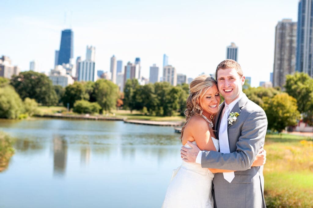 Bride and groom laughing and smiling at Lincoln Park Zoo Chicago.